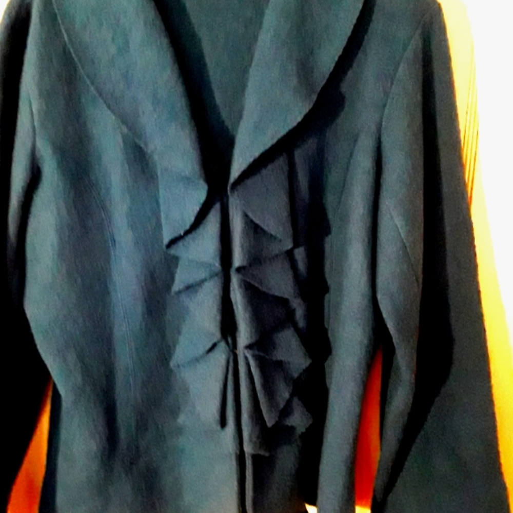 Vintage 100% wool jacket.  Clasp closing.  Xl